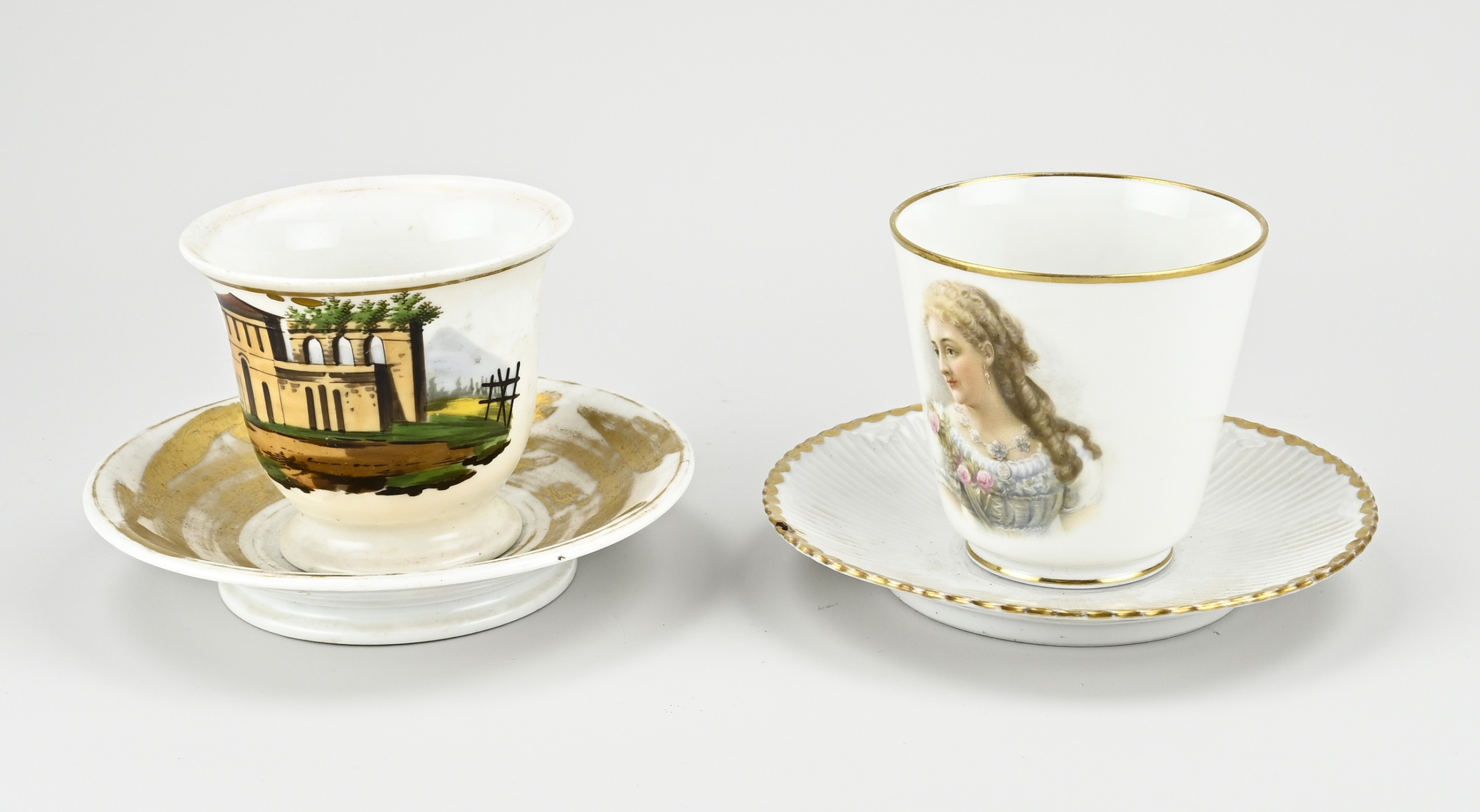 Two large 19th century porcelain cups + saucers. 19th century. France. Blind mark. 1x Ladies decor + 1x ruin/gold decor (worn).